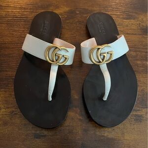 Gucci Women's Black and White Sandals with Gold Accent
